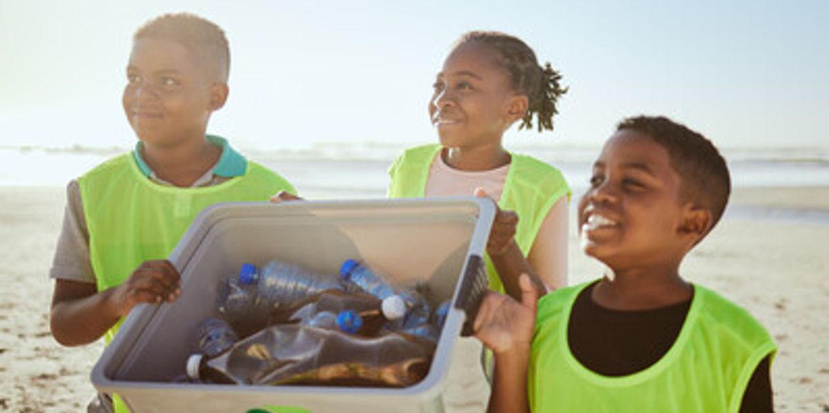Young people working together in a community clean-up