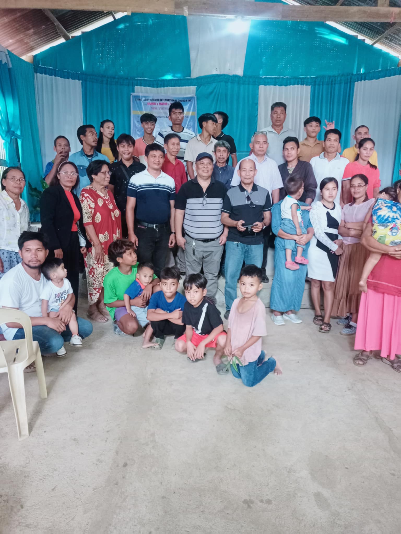 Living Word of Faith members and families gathered for fellowship and community outreach in the Philippines
